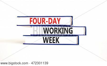 Four-day Working Week Symbol. Concept Words Four-day Working Week On Books On A Beautiful White Tabl
