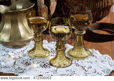 Antique German Glassware, Old Dutch Style Rummer Or Roemer Glasses With White Wine On White Lace Tab