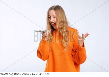 Angry Woman Arguing On Call, Screaming At Mobile Phone Speakerphone, Recording Voice Message With Fu