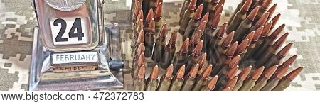 Coat Of Arms Of Ukraine From Bullets On Camouflage Clothing And Retro Calendar With Date Of Beginnin
