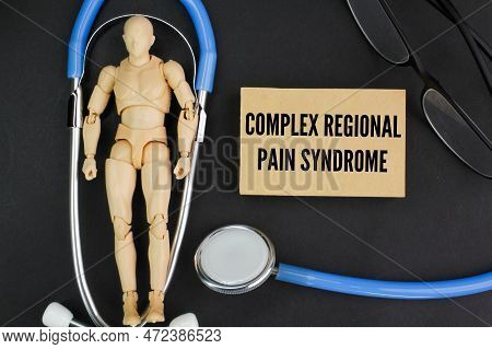 Wooden People With The Letters Crps Or The Word Complex Regional Pain Syndrome
