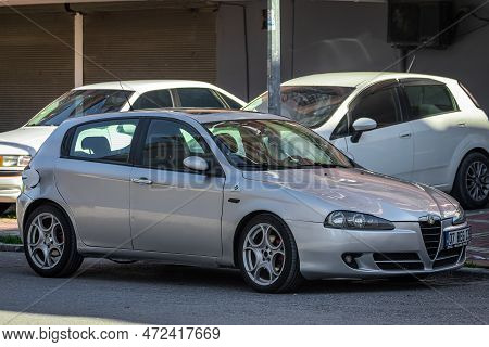 Side, Turkey - February 05 2023: White Alfa Romeo  147  Is Parked  On The Street On A Warm Day