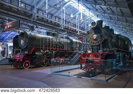 Saint Petersburg, Russia - January 12, 2022: Two Old Russian/soviet Steam Locomotives In The Museum 