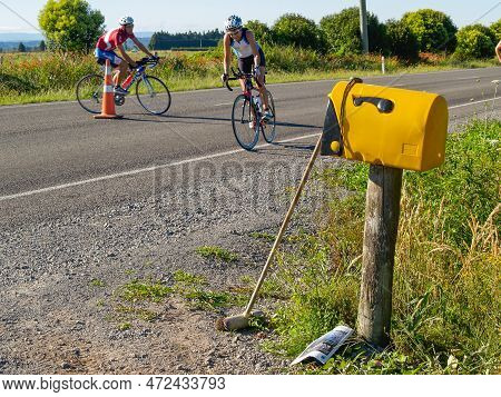 Tauranga New Zealand - January 8 2011; Contestant Cyclists On Road Riding In Port Of Tauranga Half-i