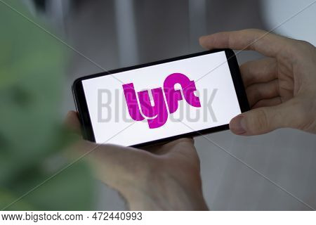 Irpen, Ukraine - January 20 20223, Closeup Of Smartphone Screen Lyft Logo Lettering With In Mans Han