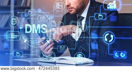 Businessman Working With Smartphone, Double Exposure Hologram With Dms. Automation Software To Archi