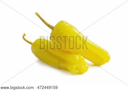 Two Pickled Yellow Peppers, Pepperoncini Or Friggitelli Isolated On White Background. Hot Pepper Mar