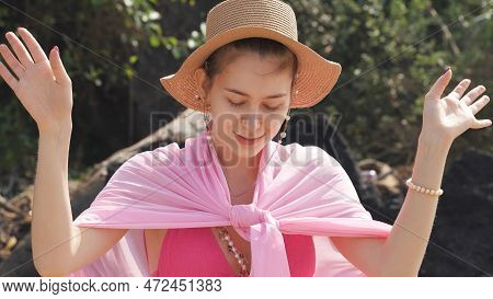 Girl In Pink Poreo And Hat Dancing. High Quality Photo