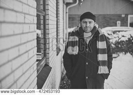 Skive, Denmark, December 2022: Man Pretending To Be A Robber, Grimaces