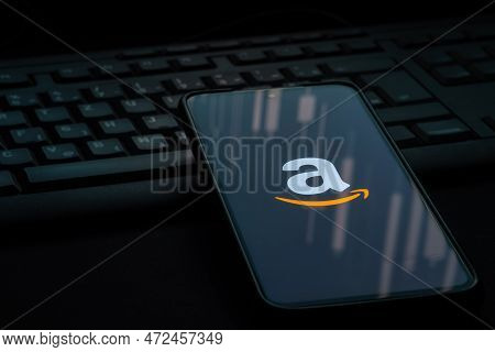 Ljubljana, Slovenia - 21 January 2023: Amazon Logo On Smartphone Screen Laying On Computer Keyboard