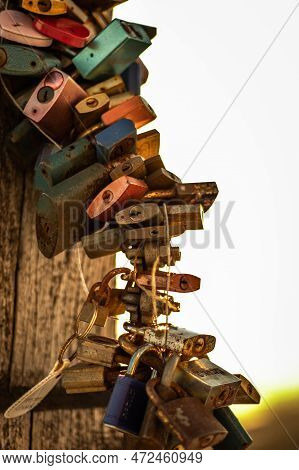 Locks Of Love Attached To The Cross On Jested At Sunrise. Winter Landscape In Liberec Region.