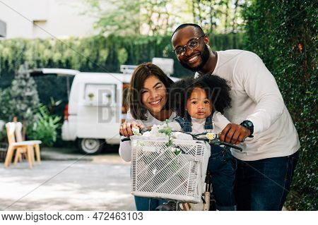 Portrait Of Happy Family Father Mother And Daughter At Home