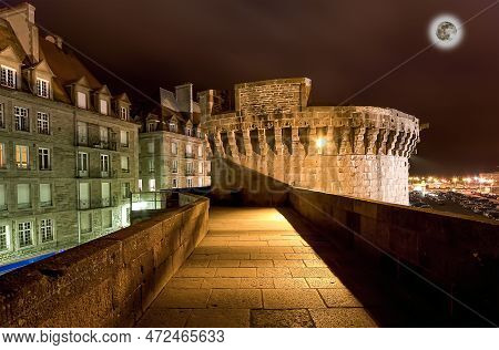 Saint-malo At Night (with The Moon)-- Is A Walled Port City In Brittany In Northwestern France On Th