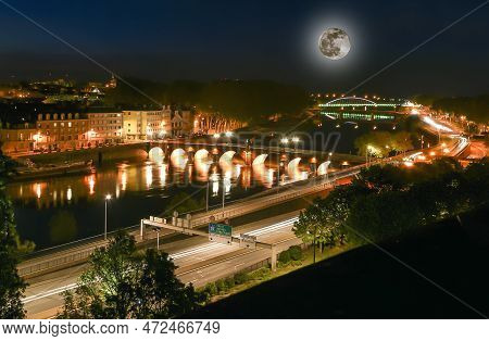 City Of Angers (with The Moon) In France. In The Maine-et-loire Department In Western France About 3
