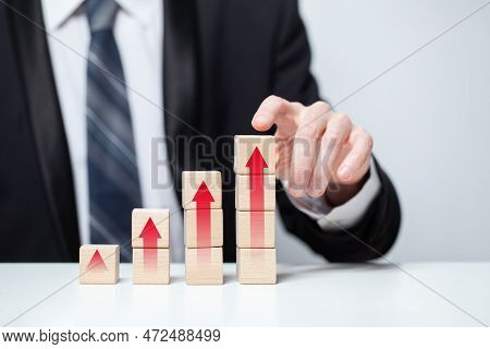 Wooden Blocks With Red Arrows Icons, Business Profit Success Concept
