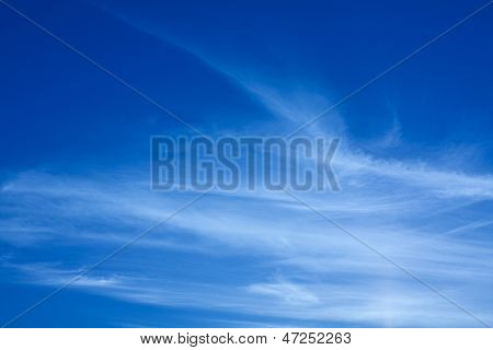 Fantastic White Clouds Against On Blue Sky