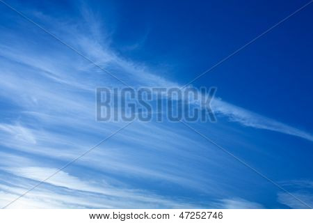 Fantastic White Clouds Against On Blue Sky