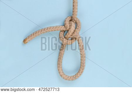 Rope Zeppelin Eye Knot, Or Rosendahl Loop On A Blue Background