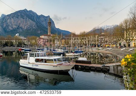 Lecco, Italy - April 2022: Yachts And Fishing Boats Docked In Marina Of Lecco, A Town On The Shore O
