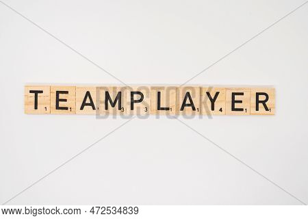 Wooden Title Spelling The Word Teamplayer Isolated On A White Background