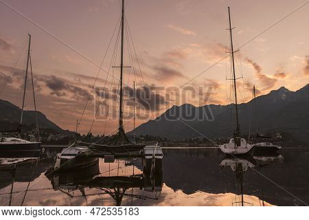 Colourful Yachts Docked At Marina Of Lecco Town On Spring Sunset. Picturesque Waterfront Of Lecco Lo