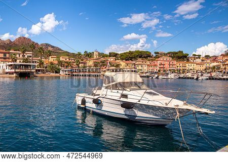 Porto Azzurro Island Of Elba Italy - 19 September 2021 Cityscape Of Harbor Of Porto Azzurro