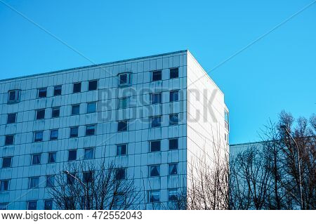 Low Angle View Of Modern Building Against Clear Blue Sky