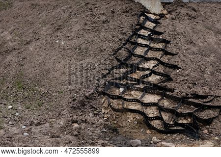 Plastic Reinforcement. Polymer Geogrid Outdoor. Erosion. Sand