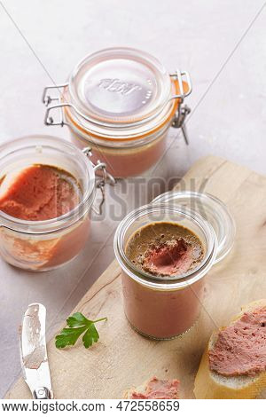 Homemade Chicken Liver Pate On Fresh French White Wheat Baguette Slices On Wooden Board, Glass Mason