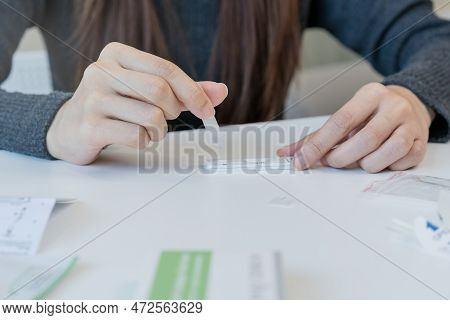 Pandemic Of Disease, Asian Young Woman, Girl Hand Holding Atk, Antigen Kit Self Test. Introducing De