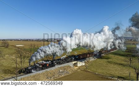 Ronks, Pennsylvania, February 18, 2023 - An Aerial View Of A Steam Double Header Freight And Passeng