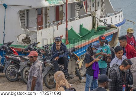 Sorong, Indonesia - February 02, 2023: Passengers At The Pier Of The Ship To Waisai Before The Ship 
