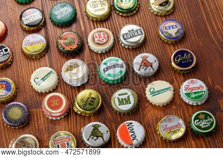 Tyumen, Russia-february 15, 2023: Set Of Beer Caps. A Mix Of Various Beer Bottle Caps