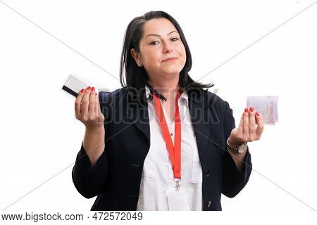 Adult Businesswoman Model In Formalwear Presnting Cred Or Debit Card And Cash Money As Bank Concept 