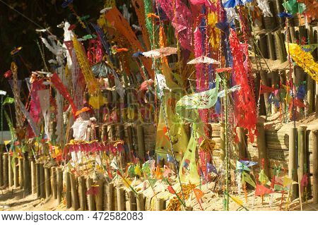 A Pagoda Made Of Sand And Colorful Flags Are Planted At Wat Wang Wiwekaram,sangkhlaburi District , K