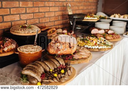 Catering Table Background. Wedding Venue Meat Snacks. Various Meat Food Background. Fatty Lard In Ce