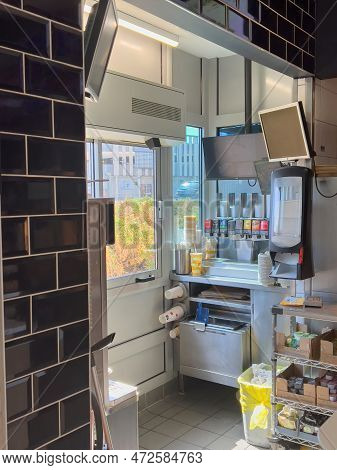 Germany - Aug 22, 2022: Empty Mcdonalds Mcdrive Point Of Sale With No Workers Inside - Multiple Choi