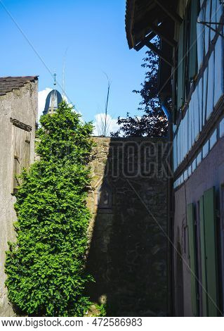 Wall With Religious Icon On The Wall Of A House Garden In Oberkirch, Germany