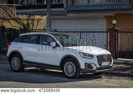 Side, Turkey -february 05, 2023:     White Audi Q2  Is Parked  On The Street On A Warm  Day