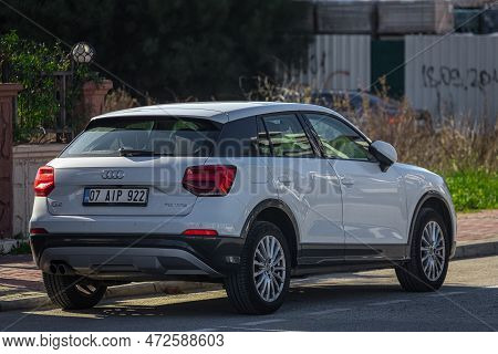 Side, Turkey -february 05, 2023:     White Audi Q2  Is Parked  On The Street On A Warm  Day