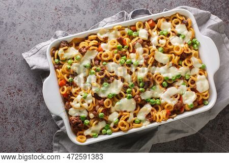 Anelli Al Forno Pasta Baked With Cheese, Ground Beef, Vegetables Close-up In A Baking Dish On The Ta