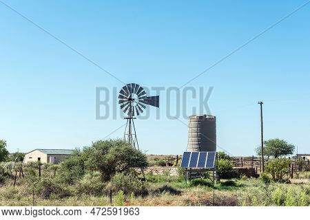 Douglas, South Africa - Mar 1, 2023: Old And New Technology At De Rust Between Douglas And Prieska. 