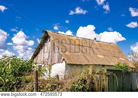Beautiful Old Abandoned Building Farm House In Countryside On Natural Background