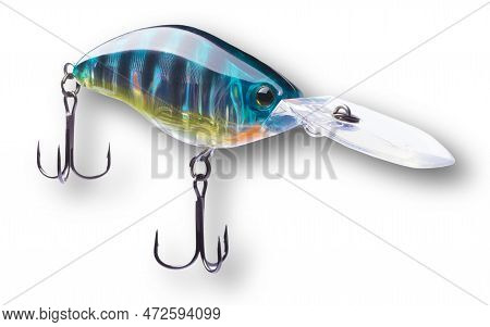 Shadow Behind A Blue And Gold Crankbait For Fishing With Two Treble Hooks