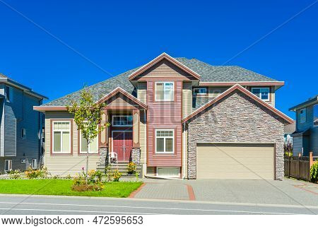 New Family House On Sunny Day On Blue Sky Background