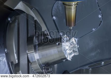 The 5-axis Cnc Milling Machine  Cutting The Turbocharger Part With Solid Ball End Mill Tool. The Hi-