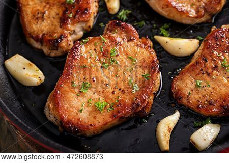Pork Chops Cooked In A Cast Iron Pan