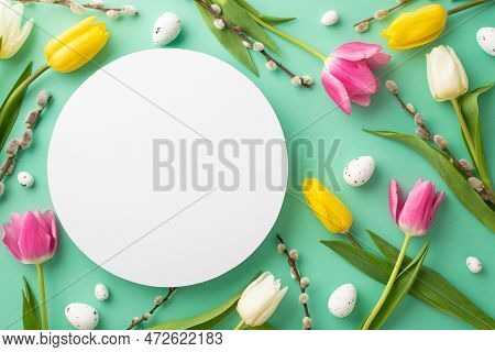 Easter Atmosphere Concept. Top View Photo Of White Circle Quail Eggs Pussy-willow And Colorful Tulip