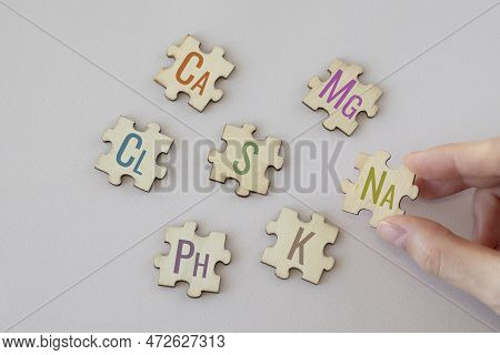 Set Of Puzzles With The Most Important Macronutrients With Colorful Inscriptions On A Beige Backgrou