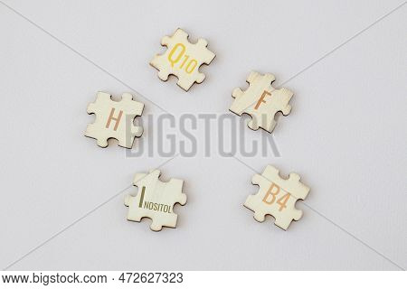 Biologically Important Elements For Humans With Multicolored Inscriptions On A Beige Background. Q10